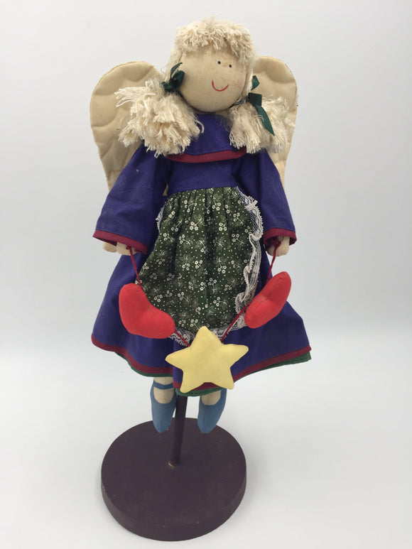 10572 - T - Angel Doll with Wood Base - Purple Dress with Floral Apron and Angel Wings - Box 39