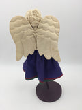 10572 - T - Angel Doll with Wood Base - Purple Dress with Floral Apron and Angel Wings - Box 39