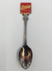 9075 - C - Coca-Cola Spoon - 1991 - Made in New Zealand - Excellent Condition - Silver Base with Embossed Coca-Cola Emblem - Box 24