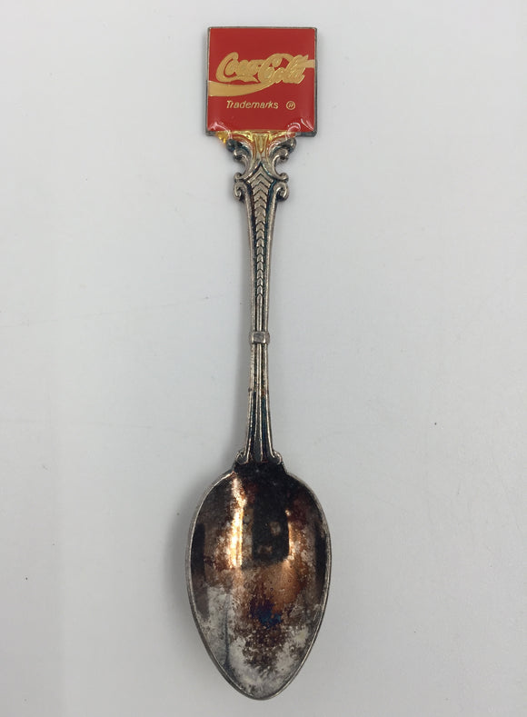 9075 - C - Coca-Cola Spoon - 1991 - Made in New Zealand - Excellent Condition - Silver Base with Embossed Coca-Cola Emblem - Box 24