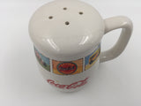 9085 - C - Coca-Cola Salt or Pepper Shaker - Glazed Ceramic With Memorable Coca Cola Photos Bordering The Top of the Single Handled Piece - Box 29