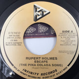 9143 - M - 45 RPM Record - Rupert Holmes - Escape(The Pina Colada Song)/Drop It - 1979 - Box 23